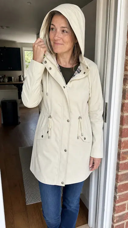 London Drawstring Parka – customer doorway with hood