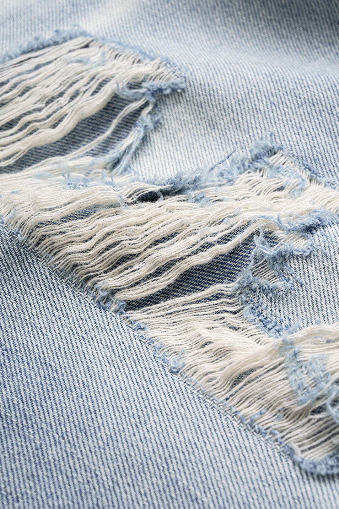 Willa London™ | Asymmetrical Ripped Denim Elegance
