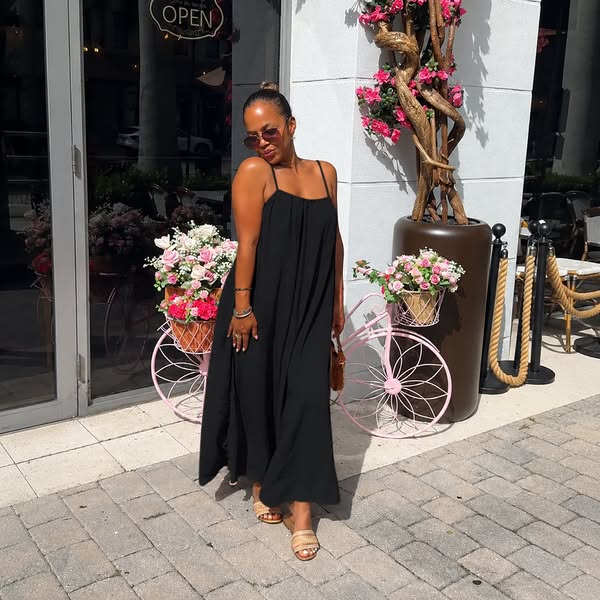 Charlotte R. wearing dress